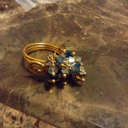 Gold tone wire wrapped dangly ring