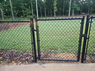 Black chain link fence with gates