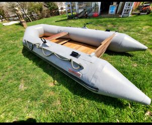 Inflatable boat  , 10'  no cuts or tears , holds air! $ 100.  CHEAP!!