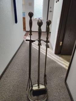 Fireplace Tool Set. Very Very Heavy. This Is A Little Talker Than The Other One We Posted.Ring Popped Out While Cleaning But Does Not Affect Anything