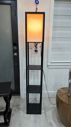 Lamp with 3 shelves.