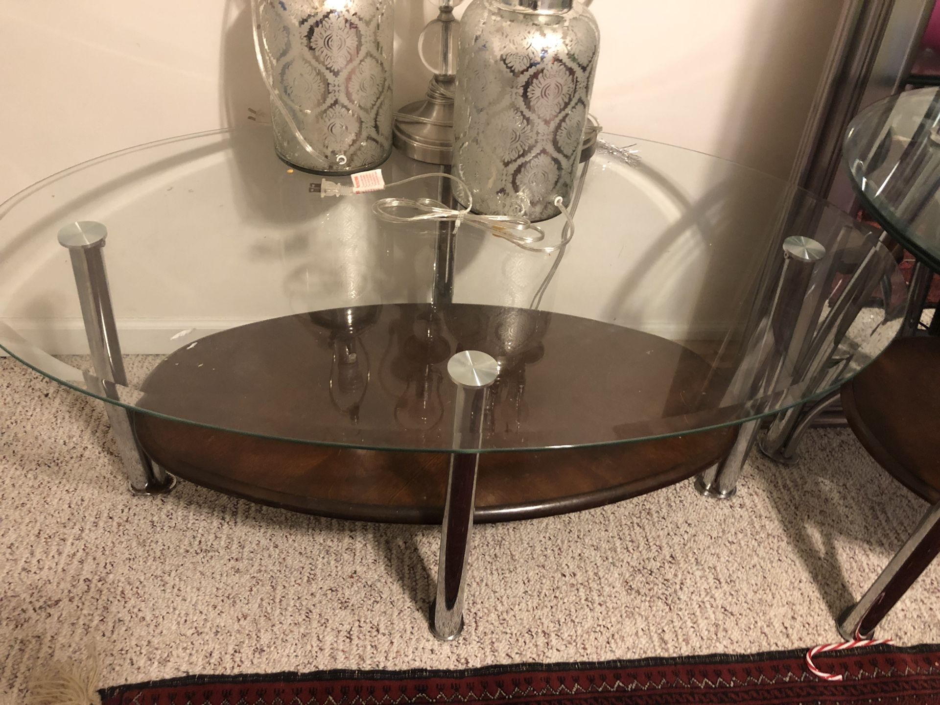 Glass oval coffee and side table
