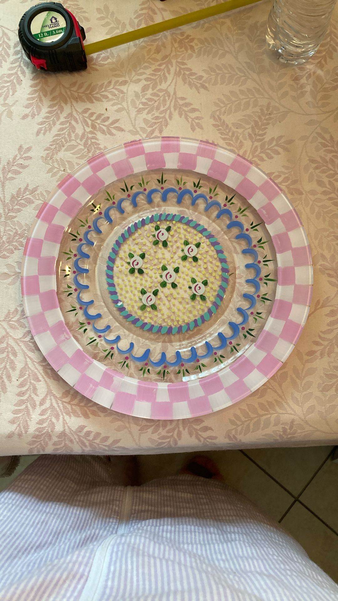 hand-painted glass plate, possibly inspired by or from a brand known for hand-decorated ceramics like MacKenzie-Childs, although the specific pattern