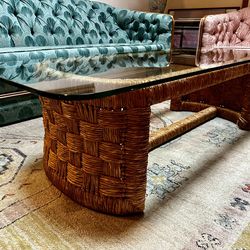 Vintage woven wicker coffee table with glass top