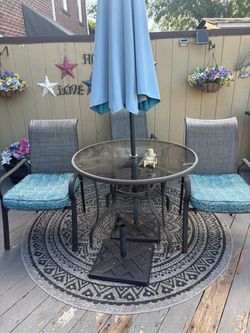 Outdoor Patio Table and Chair Set with Umbrella