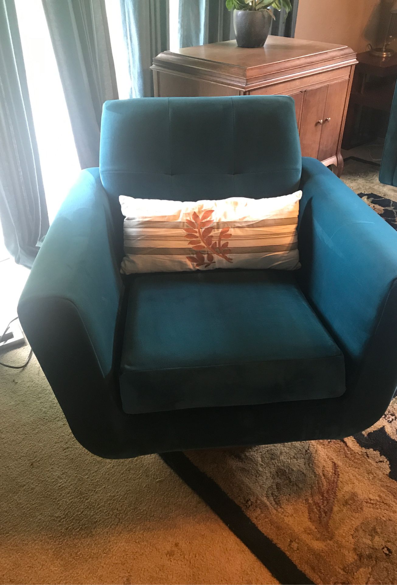 Joybird Hughs Swivel Chair and Chelsea sofa in Royal Peacock
