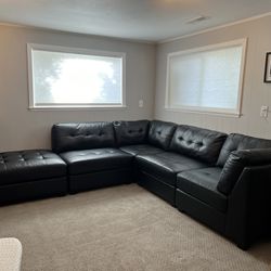 Slightly Used Black Leather sectional Couch