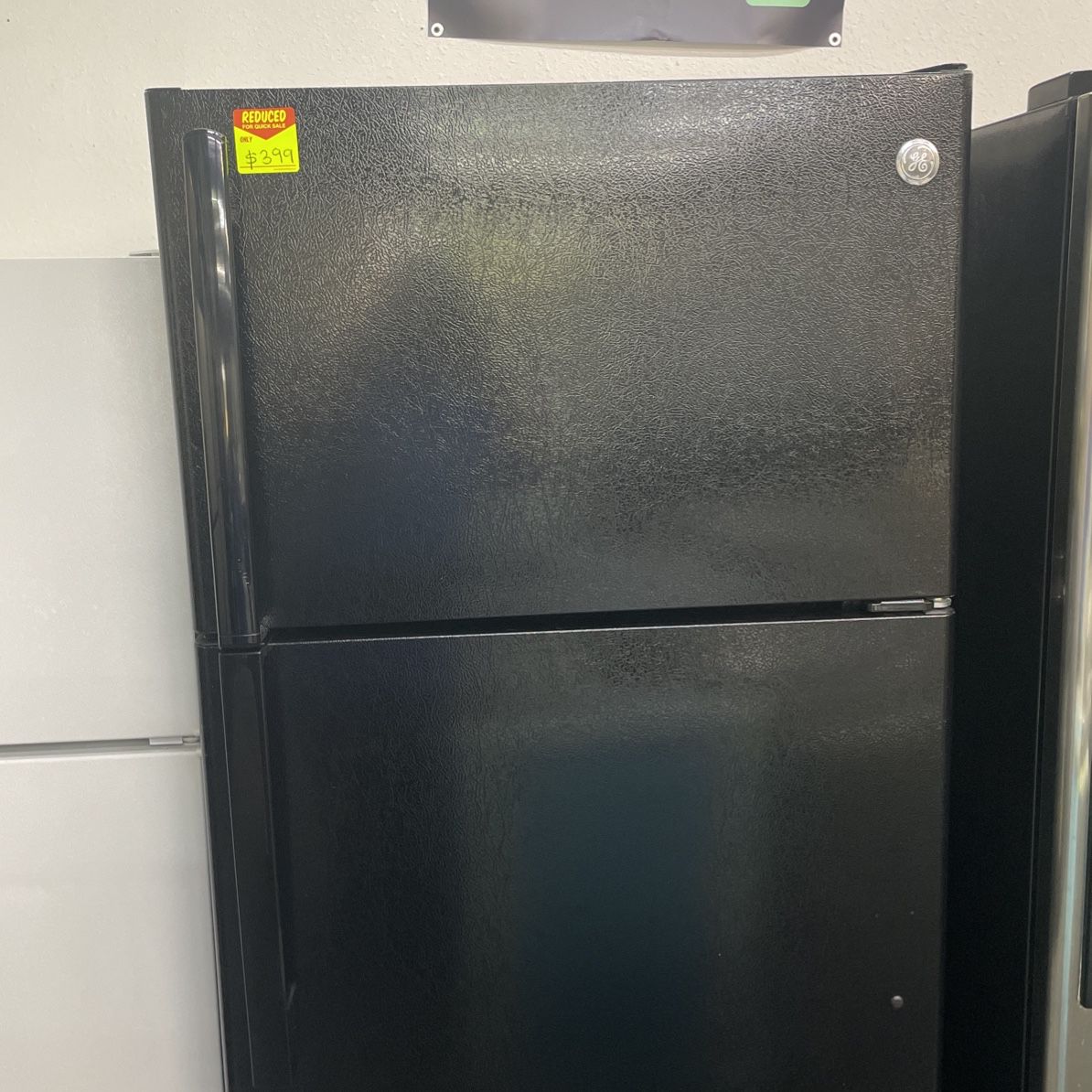 GE Refrigerator Top And Bottom In Color Black With Ice Maker