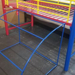 Kids loft bed with a slide and a tent