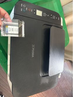 Canon printer with ink and paper