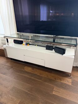 Modern white and chrome TV media console