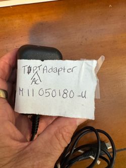 TPT MII050180-U USB AC/DC power adapter with a 5V 1.8A output.