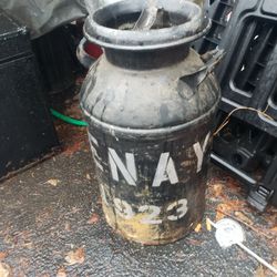 Vintage 5 gallon metal jug Penay 1923 on it