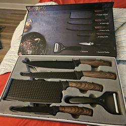 Variety Of Kitchen Knives And Filet And Camping Knives.