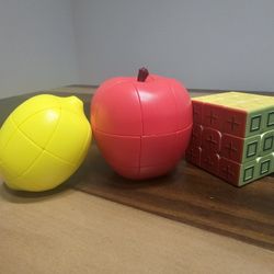 Assortment of Shape-shifting Rubik's Cubes + Braille Cube