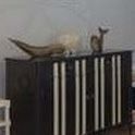 Pier One Designer Bar with storage for liquor and wine glass rack built in.