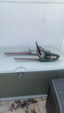 Two hedge clippers