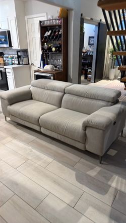 Double electric reclining love seat.