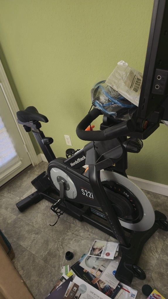 NORDITRACK includes 2 dumbells and built in fan