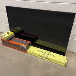 39” INSIGNIA LED TV + NEW ONN STREAMING DEVICE + NEW FIRE LED BLUETOOTH SPEAKER + NEW STAND LEGS