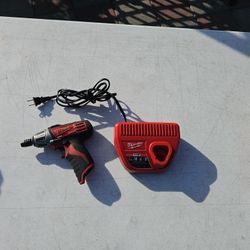 Used Milwaukee 1/4 M12 Bit Driver And Charger