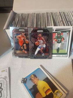 Selling a bundle of mixed basketball baseball football cards