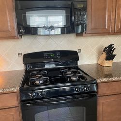 GE Appliances Refrigerator Gas Stove & Microwave 