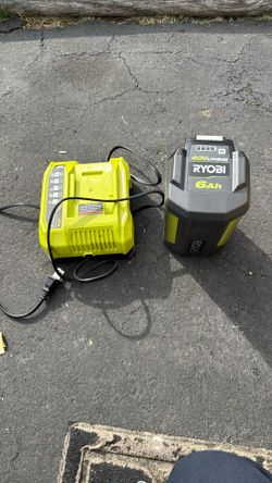 Six amp 40 V lithium Ryobi battery And Charger