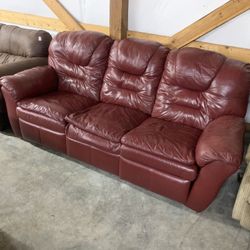 Red Leather Couch “WE DELIVER”