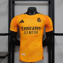 24-25 REAL MADRID away orange Emirates jersey