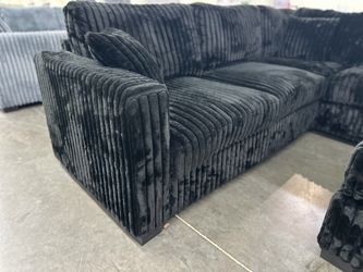 Plush corduroy sectional with ottoman included