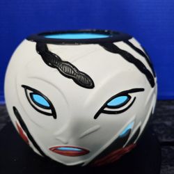 vintage PartyLite Enchanted Empress face candle holder, model PO212. 
It features an Asian-inspired design in white, black, and red ceramic 