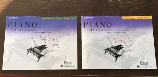 Piano lesson and performance books primer level
