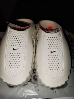 Woman's sz8 Nike mind 001