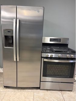 GE side x side refrigerator &. GE gas range set stainless steel