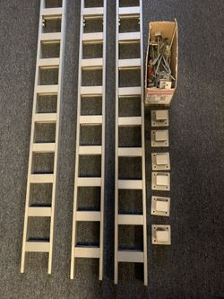 Wall-mounted ladder display rack