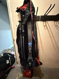 Ski, pole, gear bag bundle.