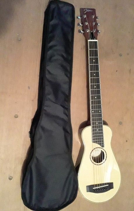 Brand New Travel Guitar And Case 