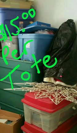 Totes Full of Christmas decorations. 8 per tote