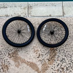 Two 20 Inch Wheels  With Tubes And Grips