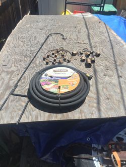 Quality garden package 50 foot fiskars soaker hose windchimes plant stand