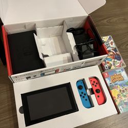 Nintendo Switch - Plus 2 Games