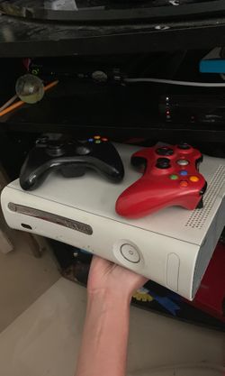 Xbox 360 with 2 wireless controllers and 5 games