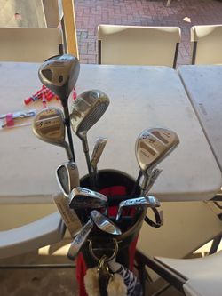 Golf clubs, bags, and carts
