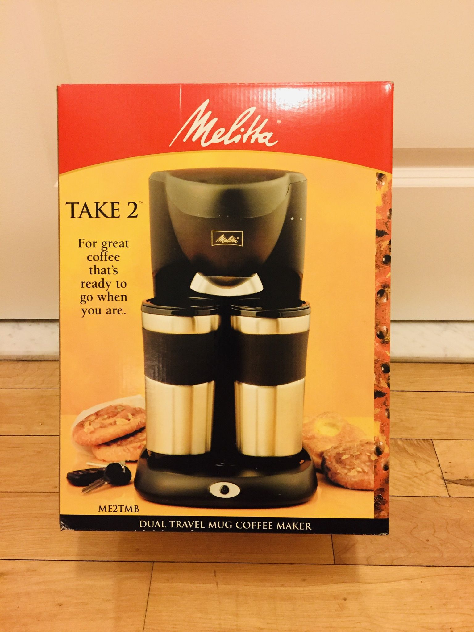 Melitta Dual Travel Mug Coffee Maker. Brand New still sealed in original box. Including 2 Stainless Steel 14-oz. travel mugs with rubber grips. Brews 