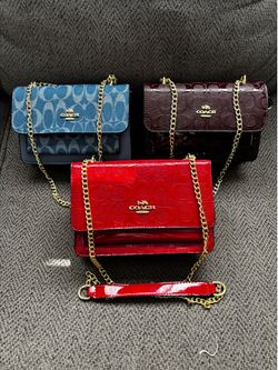 Bolso coach $35 cada una