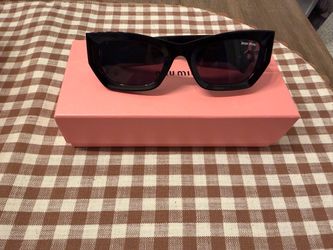 Mui Mui black sunglasses