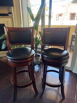 Pair of Cherry Wood Swivel Stools
