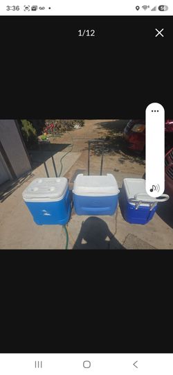 Three ice chests. The handle's on the big Cooper's do not go down. Otherwise good condition