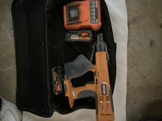 RIDGID Bag With RIDGID Gun And 2 Chargers And A Power Port 